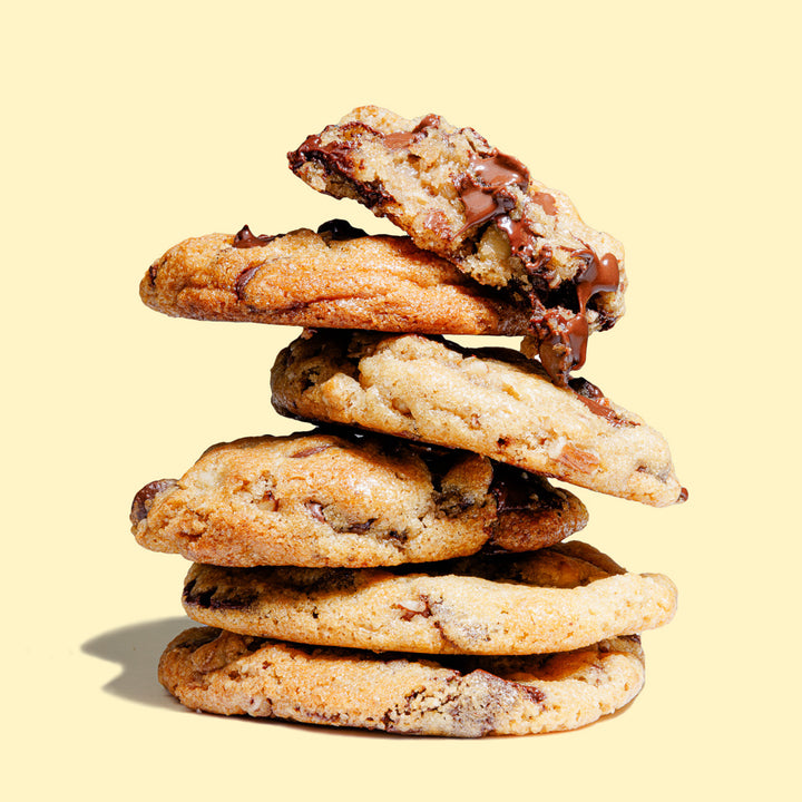 cookies with melted chocolate stacked on top of each other.