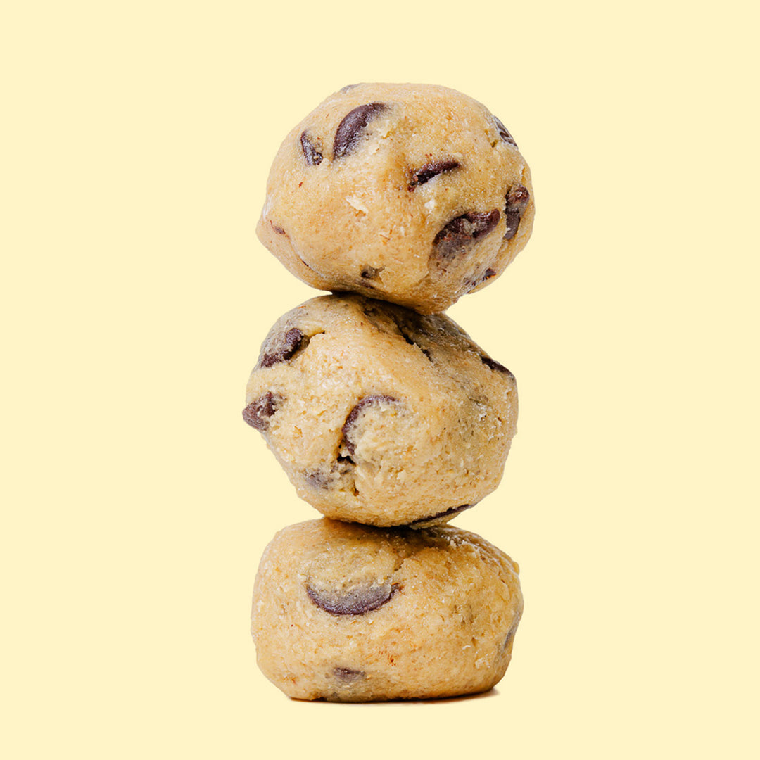 3 cookie dough balls stacked on top of each other.